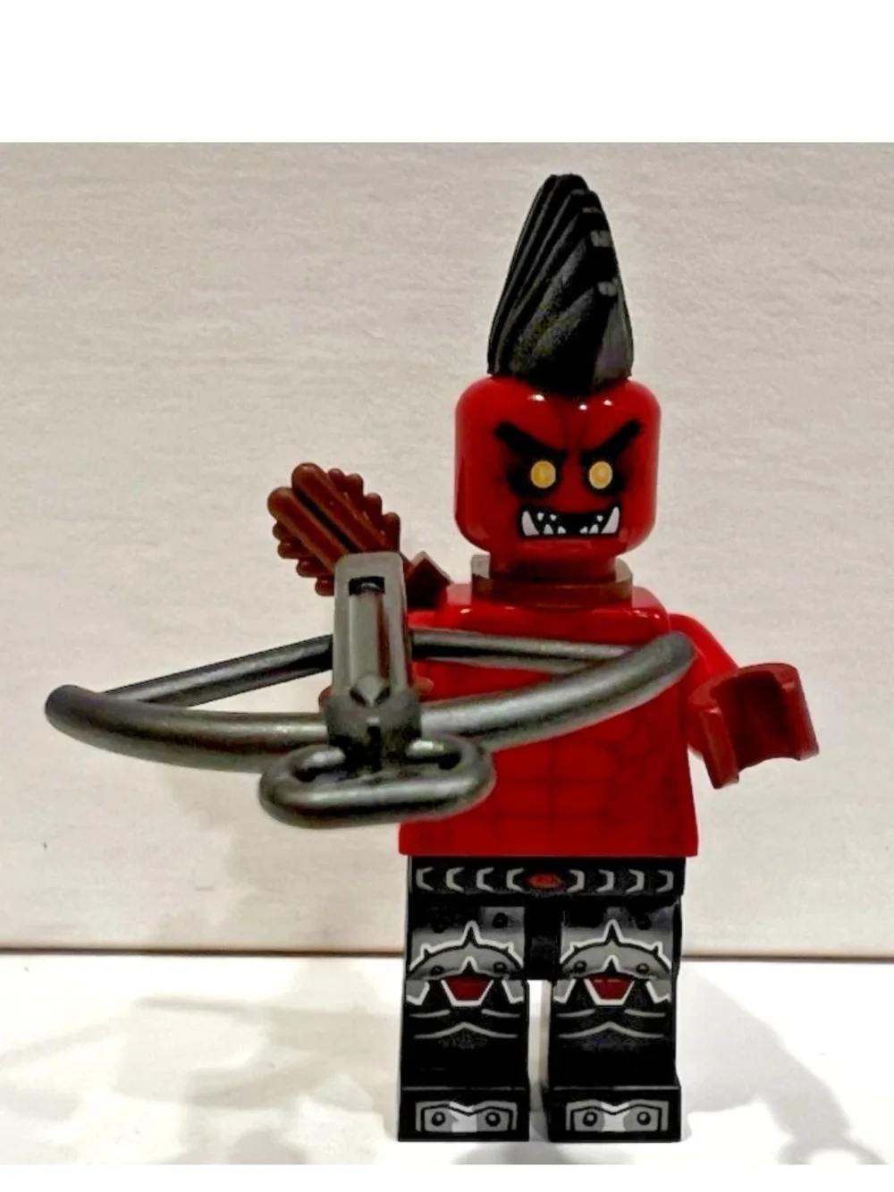 Lego Red Demon Warrior Minifigure with Black Hair and Silver Crossbow